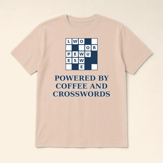 Powered by Coffee and Crosswords design shown on a t-shirt